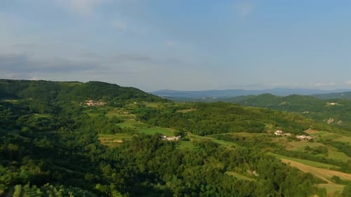 Orchard farm and lake Butoniga water reservoir dam in Croatia pan right motion, Aerial drone reveal