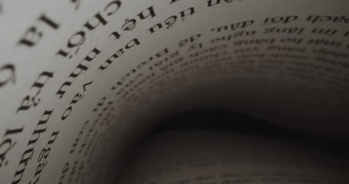 Close-Up Inside View of a Book Pages with Text
