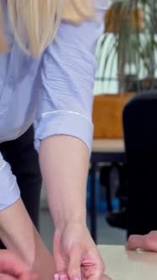 Architects Reviewing a Blueprint in the Office