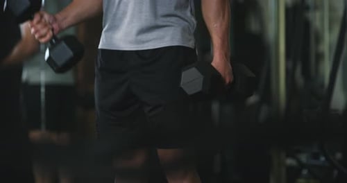 Dumbbell, weight lifting or strong man with arm exercise, muscle growth workout