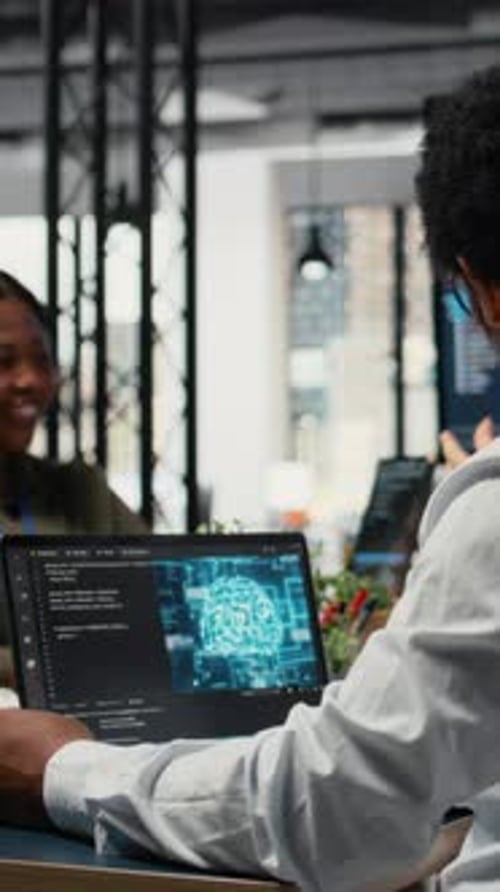 Vertical Video Data Scientists in Startup Office Brainstorming Leveraging AI Tech