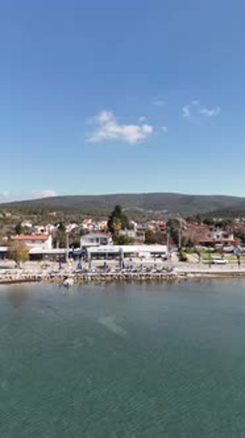 Vertical Aerial View of Coastal Business and Fishing Harbor in Ozbek, Urla, Izmir, Turkey