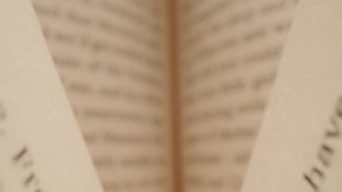 Macro Camera Moving Inside the Books Close Up of English Texts on Book Sheets Macro Shot Moves