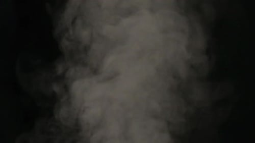 Billowing White Smoke on Black Background