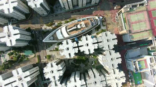 Aerial view of Hong Kong Whampoa buildings and unique Cruise Ship shaped shopping mall.