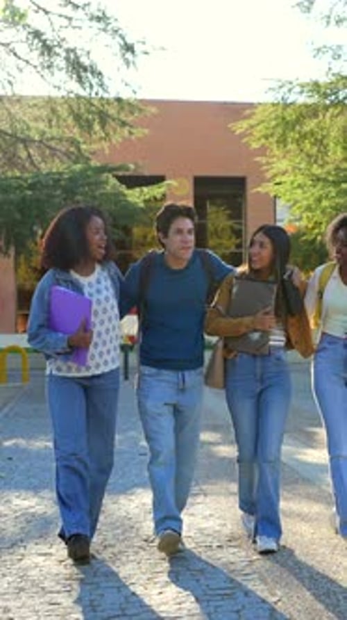Diverse University Students Walking Together on Campus