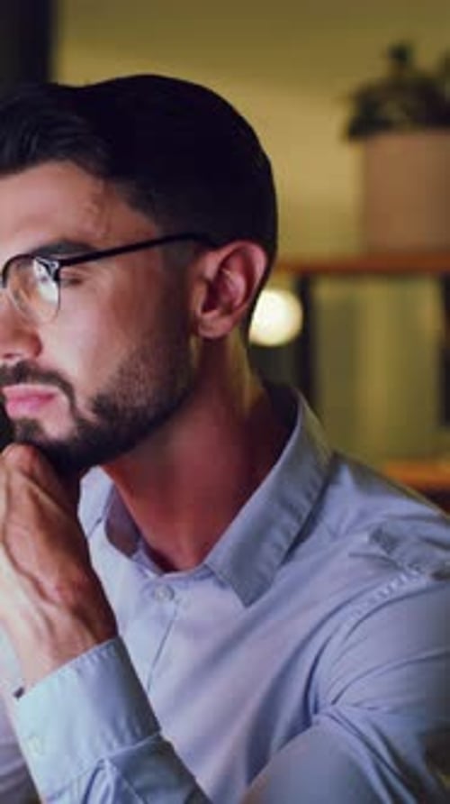 Thoughtful Man Wearing Glasses Looking Upward