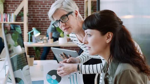 Digital marketing, computer and team of women planning, collaboration or strategy for website sales