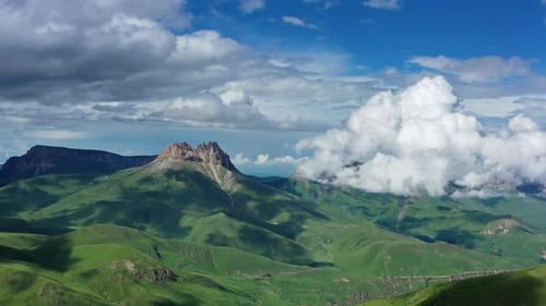 Aerial View of Mountains and Lush Green Hills
