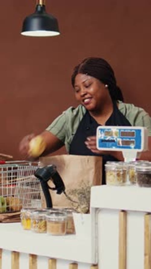 Vertical Video Retailer Weighting Fresh Fruits and Vegetables at Checkout