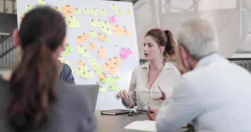 Team Collaborating in Office Workplace Meeting