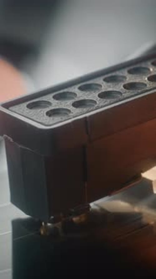 Macro Close Up of Needle Gently Scratching Grooves Playing Song On Vintage Turntable