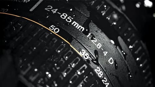 Drops of Rain Fall on the Lens Filmed on a Highspeed Camera at 1000 Fps