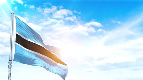 Botswana Flag Waving Against a Bright Blue Sky