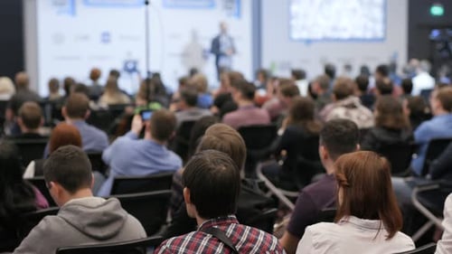 Audience at Business Conference, Watching a Speaker
