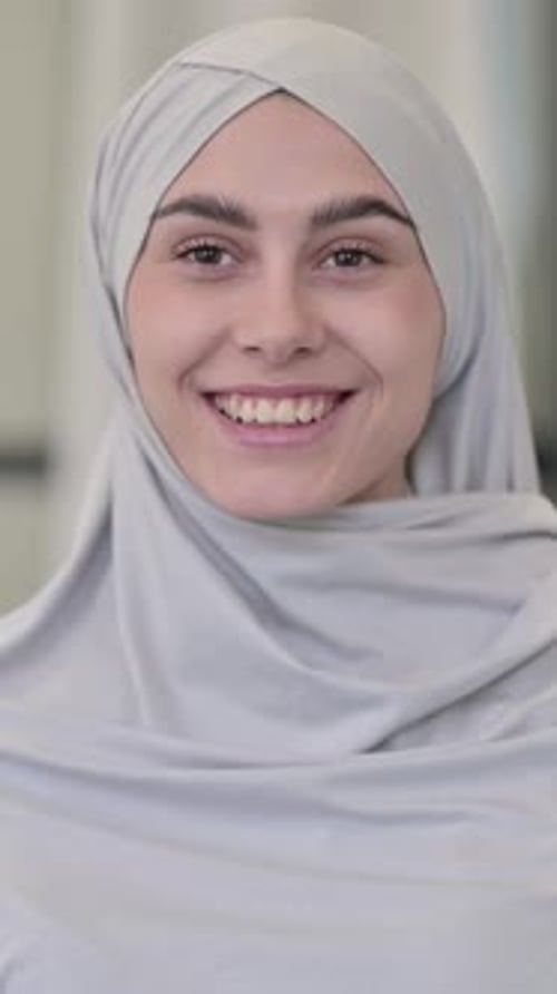 Young Arab Woman Shaking Head as Yes Sign, vertical video