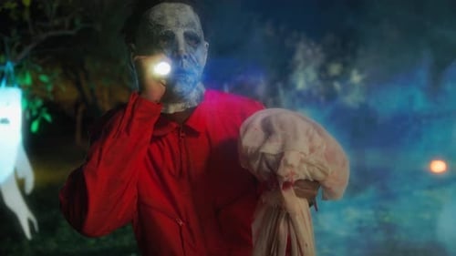 Monster Searches For His Victims With Flashlight On Halloween Night With Torch