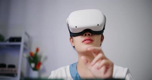 Woman Using a VR Headset in Home Setting