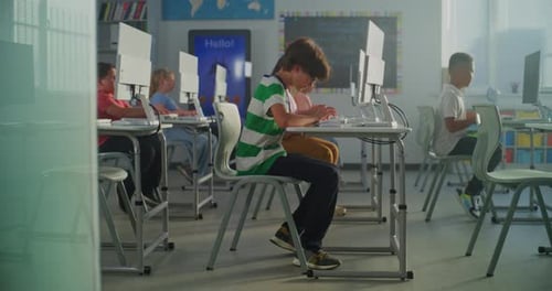 Students Working on Computers in Modern Classroom