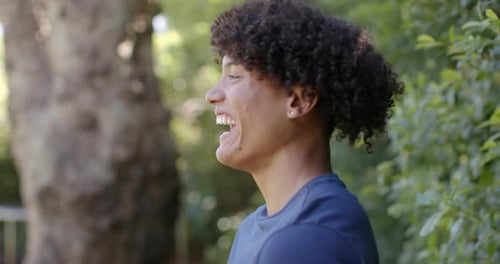Happy Young Man Laughing Outdoors