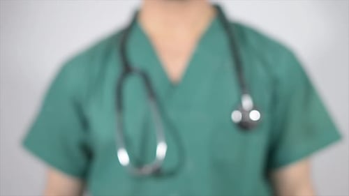 Doctor Writes BMI on Clear Screen