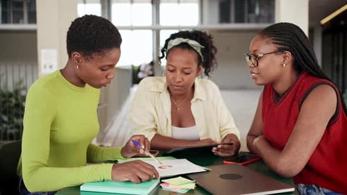 Female African American Students at University Campus Working Together on Creative Task Prepare for