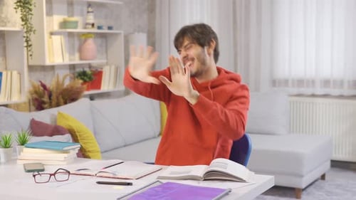 Student Dancing in Celebration After Finishing Work