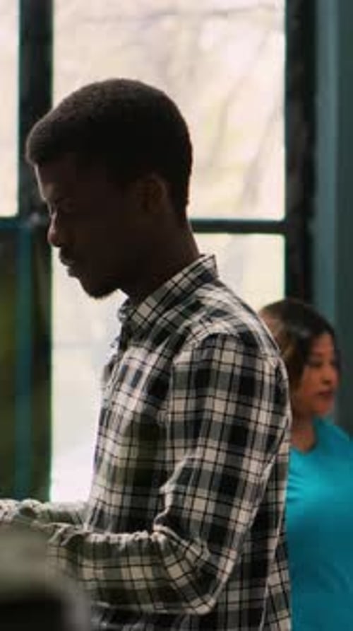 Young Adult Smiling in Modern Office Setting