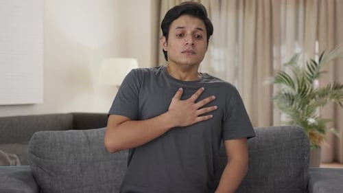 Indian man having an Asthma attack