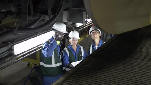 Transit Workers Inspecting Light Rail Undercarriage Adult