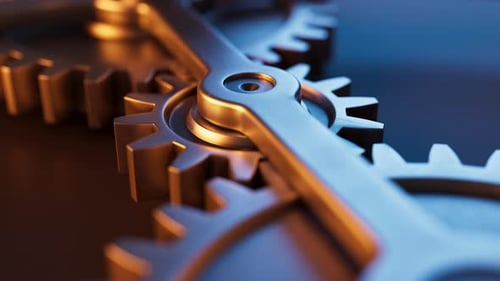 Loop-Animation einer mechanischen Struktur aus Metallzahnrädern.