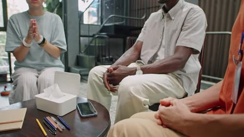 Adults in a Support Group Talking