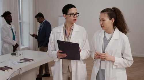 Medical Professionals Discussing Patient Care in Hospital Setting