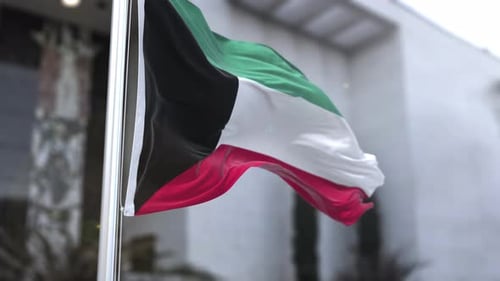 Realistic Kuwait Flag Waving in Wind on a Pole