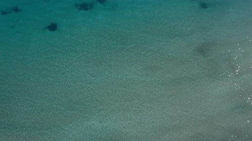 Top View Emerald Green Clear Water of Ocean Outdoors in Sunrays
