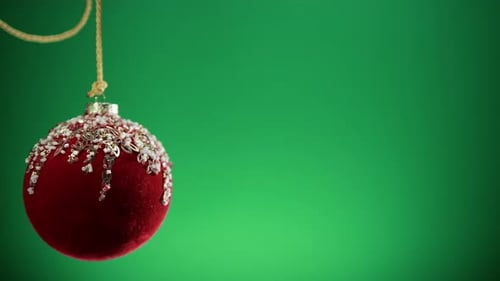 Red Christmas Ball with Green Background