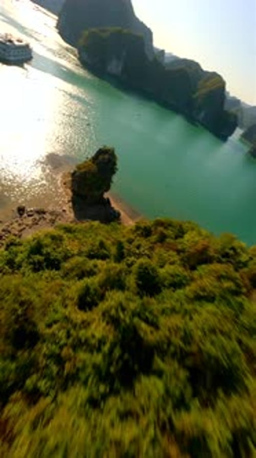 Cinematic FPV Flight Close To Limestone Rocky Sslands On Ha Long Bay in Vietnam