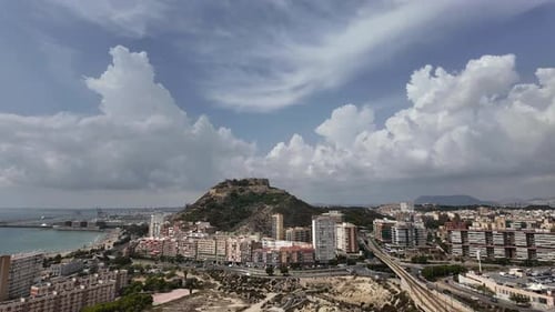 Aerial time lapse of Alicante city, Spain, with a view of city center, castle and south coast