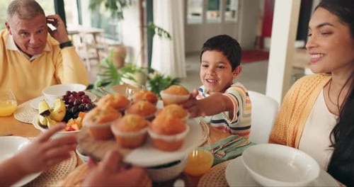 Family Enjoying Breakfast Together at Home
