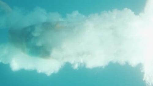 Underwater Footage of Man Jumping into Water and Swimming. Diving in the Ocean. Video Footage with