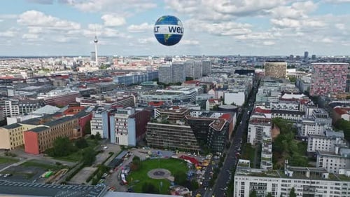 Aerial view revealing The Berlin Weltballon in Berlin city centre on a sunny day