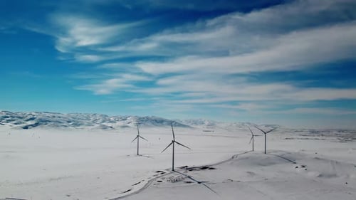 Wind Turbines In Winter With Snow