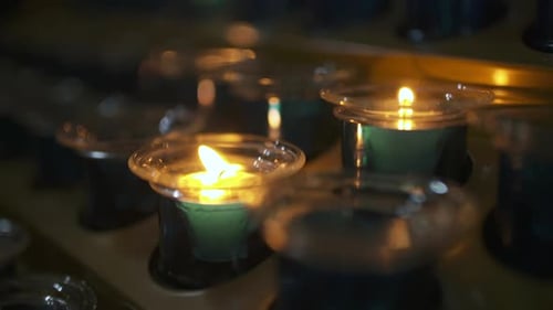 Burning Candle in Church