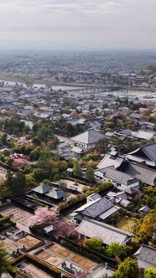 Aerial drone view of the Arashiyama district in Kyoto Japan in daylight