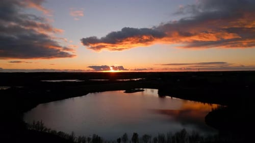 Aerial view of autumn sunset over lake