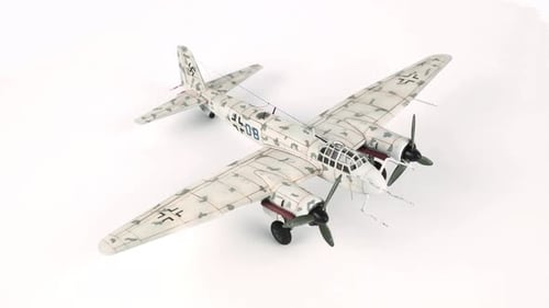 Rotating Overhead Full Shot of Model Airplane