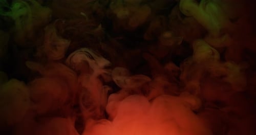 Colorful Green and Orange Ink Cloud Explosion