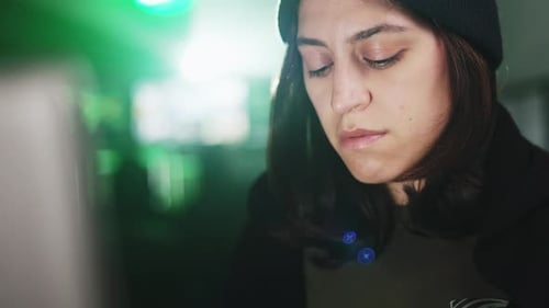 Woman Working at Computer Late at Night