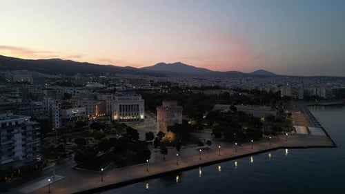 Aerial video above the White Tower and coastline in Thessaloniki, Greece