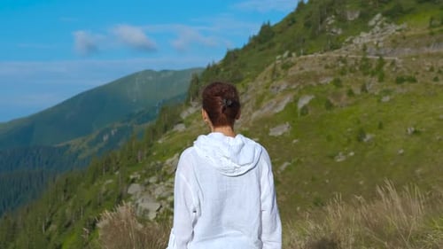 Alone Lady Enjoy Green Mountains and Valley